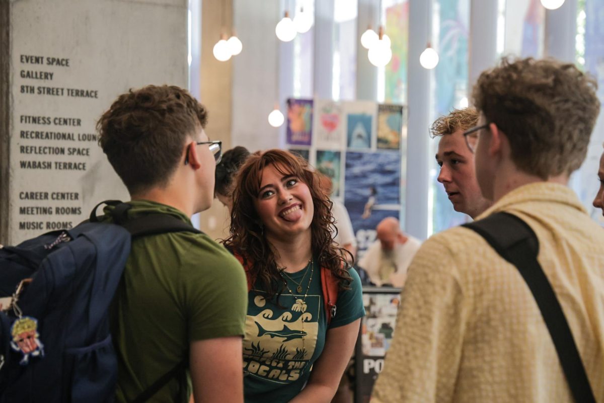 Students hang out on the first floor of the Student Center during the first day back on campus for the fall semester on Tuesday, Sept. 8, 2026.