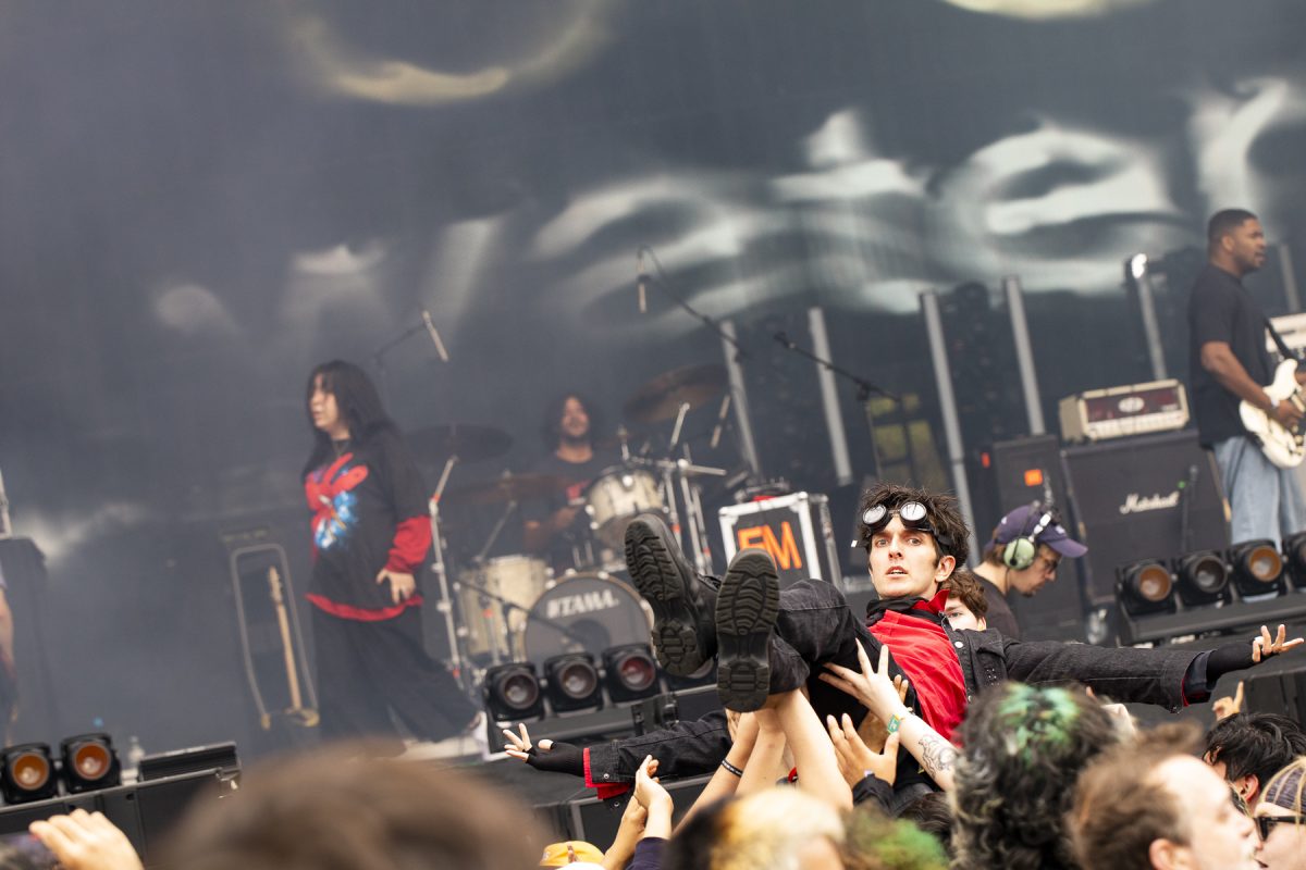 A person crowd-surfs during Fleshwater's set at the Roots Stage at Riot Fest on Friday, Sept. 18, 2026.