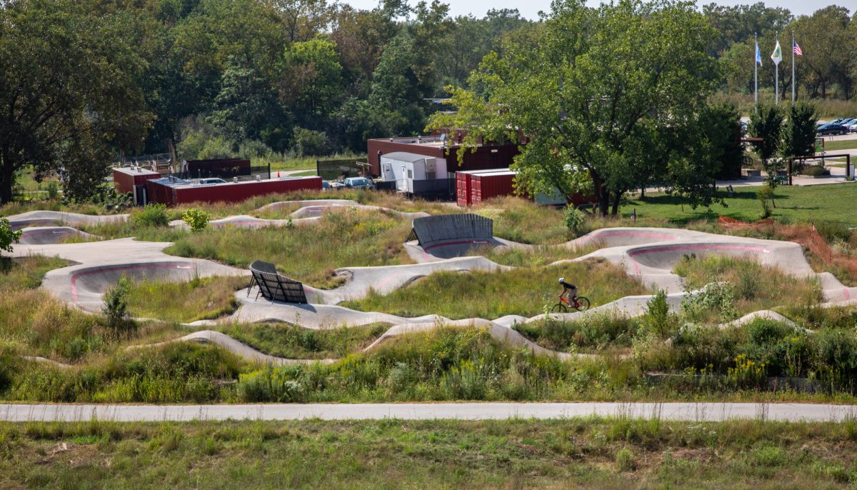 A biker zips away on an empty pump track at the Big Marsh Park in Chicago’s South Deering community area amidst 95-degree weather on Wednesday, Sept. 2, 2026. This photo is part of the Columbia Chronicle’s “77 Community Areas” project, documenting Chicago in celebration of America’s 250th birthday.