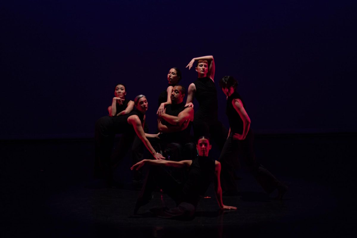 Dancers pose under dramatic stage lighting during the "CounterBalance" 15th Anniversary Showcase at the Dance Center at 1306 S. Michigan Ave. on Friday, Oct. 16, 2026.