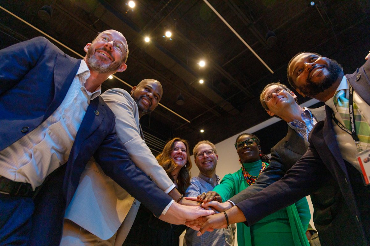 Members of the Office of the President show unity in working together towards a greater cause by putting their hands together at the State of the College address on the 5th floor of the Student Center on Wednesday, Oct. 7, 2026.