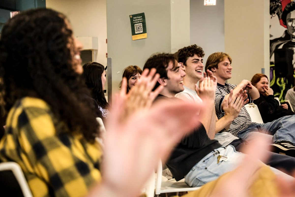 Filled with laughter, students give a round of applause after a student showcase of comedy improv on Friday, Oct. 9, 2026.