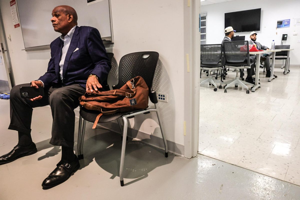 Victor P. Henderson and Hilario Dominguez, two contending candidates for Chicago School Board president, sit in separate rooms prior to a Chicago Board of Education President Forum held at the Live TV Studio in the 33 E. Ida B. Wells Dr. building on Thursday, Oct. 22, 2026. The public will be able to vote for the city's first elected Chicago School Board president during the upcoming midterm general election.