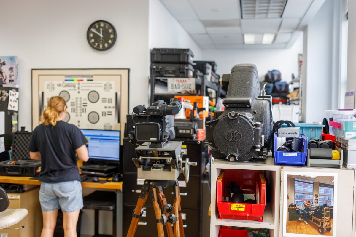 Callie Kubal takes care of equipment check out for a student at the Advanced Camera Center on the 5th floor of the 1104 S. Wabash Ave. building on Monday, Oct. 12, 2026.